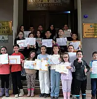 TİRE'DE ÇOCUKLARA KÜLTÜR VE SİNEMA DOLU KARNE SEVİNCİ